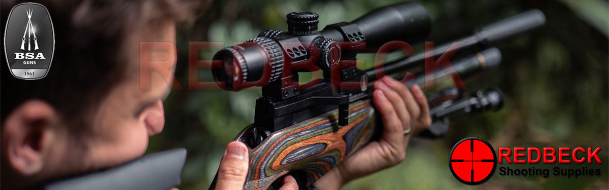 BSA ULTRA Pro Air Rifle Wilderness Edition with Green Laminate Stock shown in the field in shooters hands.