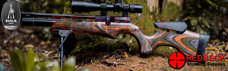 shown in the wood with bipod and muzzle break attached.