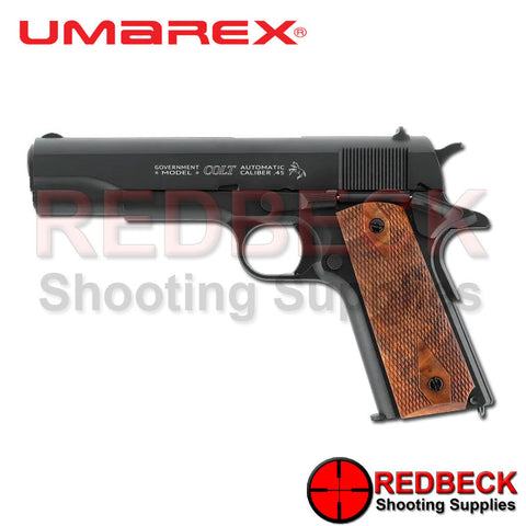 Colt 1911 classic 4.5mm BB firing pistol with walnut grips shown from left hand side